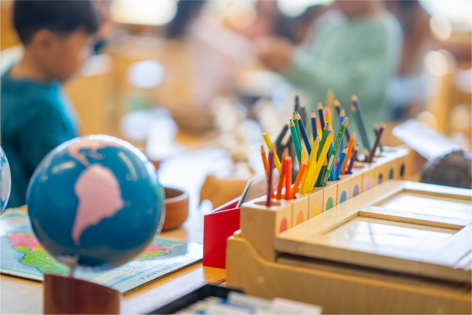 Teacher and students in a classroom using AI tools